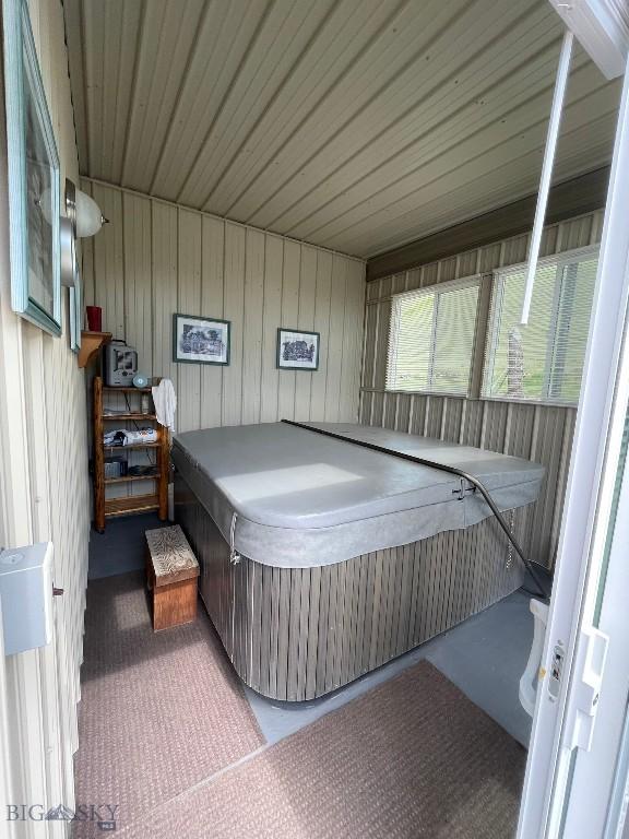 682 E River Rd, Pray, MT 59065 - wooden terrace with an indoor hot tub