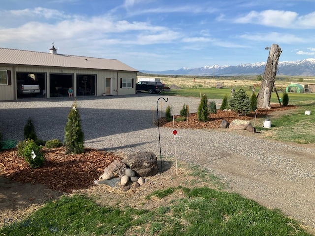 682 E River Rd, Pray, MT 59065 - view of dirt / gravel driveway with a mountain view