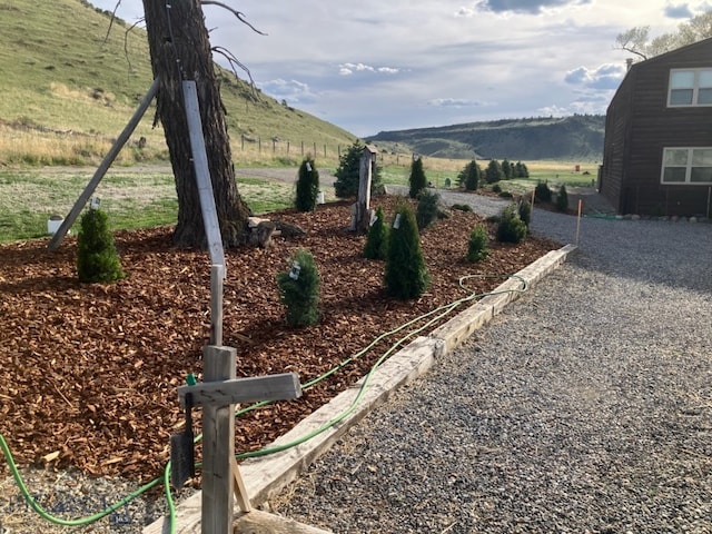 682 E River Rd, Pray, MT 59065 - view of yard with a view of countryside and a mountain view