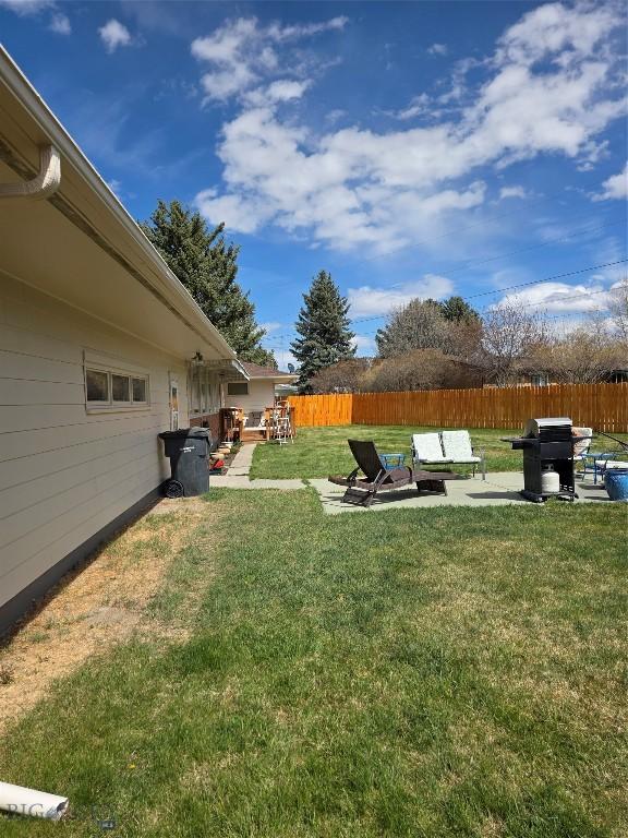 606 S Arizona, Dillon, MT 59725 - view of yard featuring a patio area