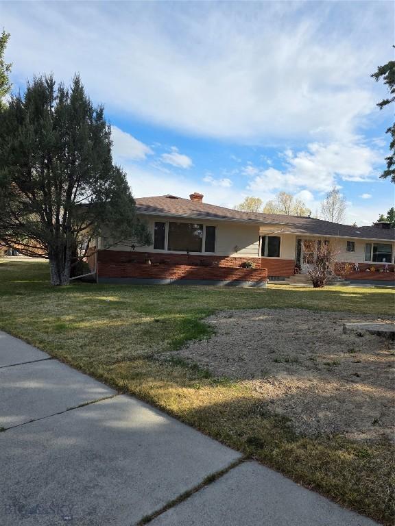 606 S Arizona, Dillon, MT 59725 - single story home featuring a front yard