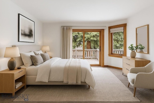 1413 Cherry Dr, Bozeman, MT 59715 - bedroom with access to outside, multiple windows, and carpet floors