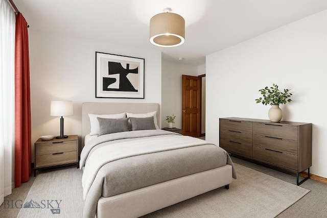 1413 Cherry Dr, Bozeman, MT 59715 - bedroom with light colored carpet and baseboards