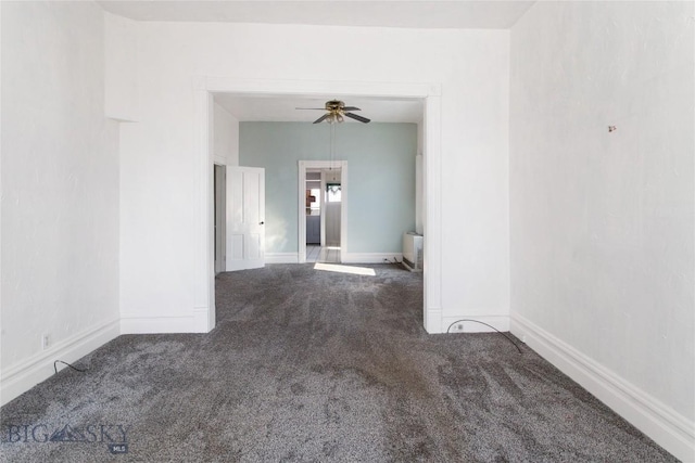 797 Hornet, Butte, MT 59701 - spare room with carpet flooring, ceiling fan, and baseboards