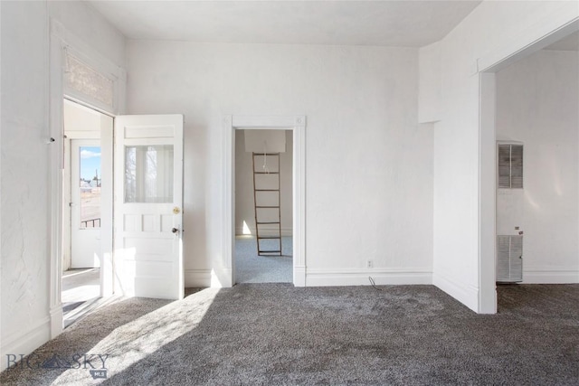 797 Hornet, Butte, MT 59701 - carpeted spare room featuring a heating unit