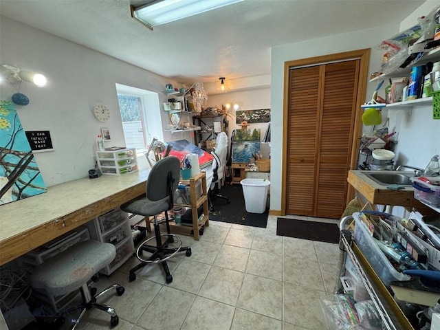 home office featuring light tile patterned floors