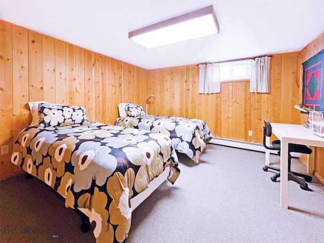 carpeted bedroom with wood walls and baseboard heating