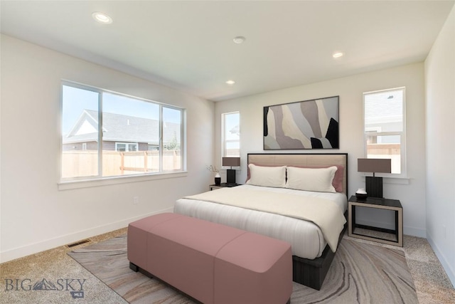 1520 Cyril Way, Belgrade, MT 59714 - bedroom with recessed lighting and light carpet