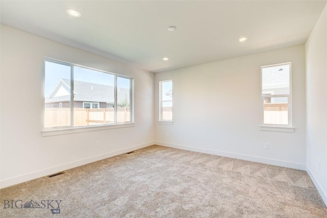 1520 Cyril Way, Belgrade, MT 59714 - empty room featuring carpet flooring and recessed lighting
