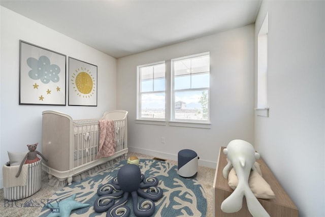 1520 Cyril Way, Belgrade, MT 59714 - carpeted bedroom featuring baseboards and a crib