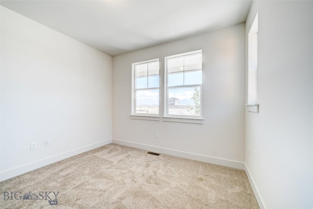 1520 Cyril Way, Belgrade, MT 59714 - carpeted spare room featuring baseboards