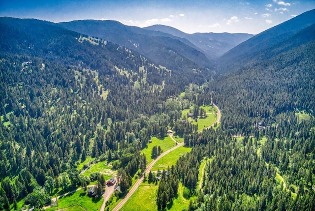 14470 Cottonwood Canyon Rd, Bozeman, MT 59718 - birds eye view of property featuring a wooded view and a mountain view