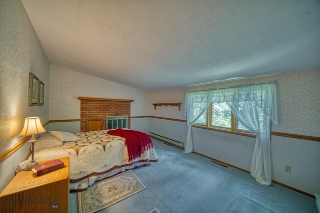 14470 Cottonwood Canyon Rd, Bozeman, MT 59718 - bedroom featuring lofted ceiling, a baseboard radiator, wallpapered walls, visible vents, and carpet floors