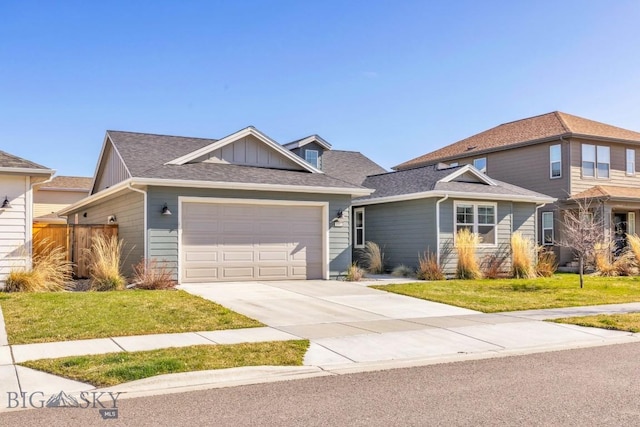 1511 Masterson, Belgrade, MT 59714 - craftsman inspired home with concrete driveway, board and batten siding, roof with shingles, a front yard, and an attached garage