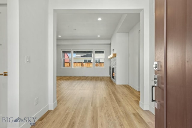 1511 Masterson, Belgrade, MT 59714 - hall featuring baseboards, recessed lighting, and light wood-style flooring