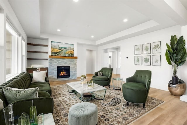 1511 Masterson, Belgrade, MT 59714 - living room with a fireplace, recessed lighting, wood finished floors, and a tray ceiling