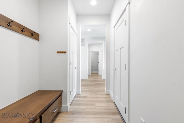 1511 Masterson, Belgrade, MT 59714 - mudroom with light wood finished floors, recessed lighting, visible vents, and baseboards