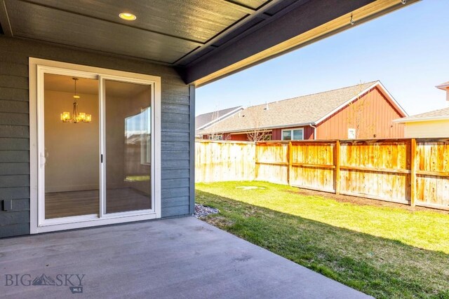 1511 Masterson, Belgrade, MT 59714 - fenced backyard featuring a patio
