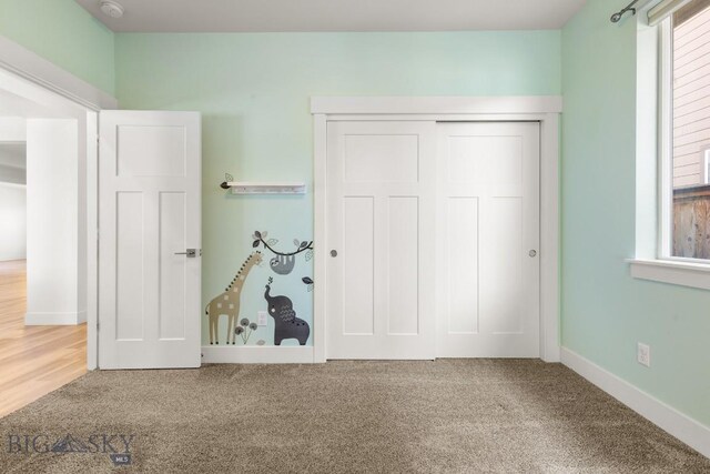 1511 Masterson, Belgrade, MT 59714 - unfurnished bedroom featuring carpet flooring and a closet