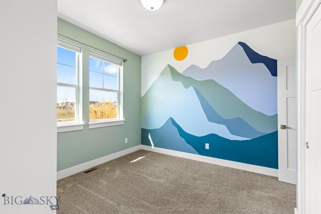 1511 Masterson, Belgrade, MT 59714 - spare room with carpet, visible vents, and baseboards