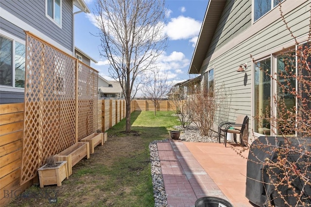 3383 Sora Way, Bozeman, MT 59718 - fenced backyard with a patio area