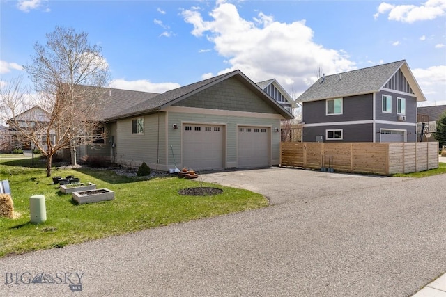 3383 Sora Way, Bozeman, MT 59718 - view of front of home with asphalt driveway and an attached garage