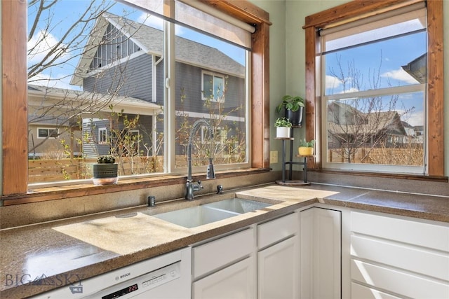 3383 Sora Way, Bozeman, MT 59718 - kitchen featuring dishwasher and white cabinetry