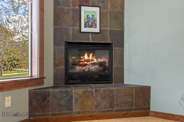 3383 Sora Way, Bozeman, MT 59718 - detailed view of a tiled fireplace and baseboards