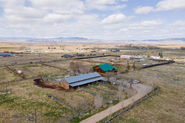 drone / aerial view with a rural view and a mountain view