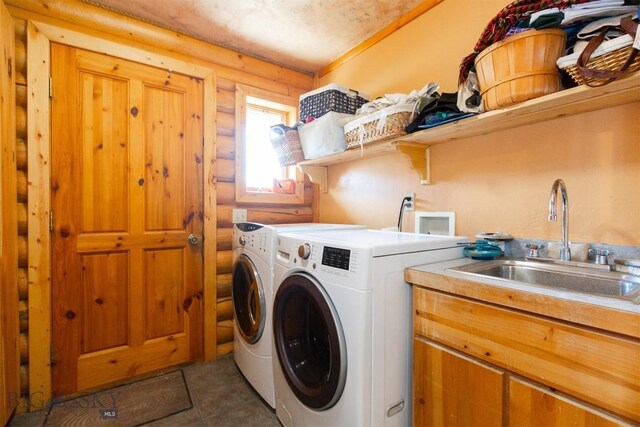 18 7m4r Rd, Sheridan, MT 59749 - laundry room featuring log walls, independent washer and dryer, and cabinet space