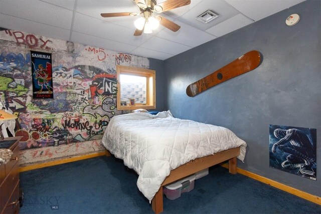 18 7m4r Rd, Sheridan, MT 59749 - bedroom featuring a paneled ceiling, carpet floors, and ceiling fan