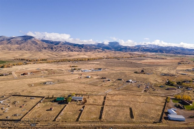 aerial view with a mountain view and a rural view