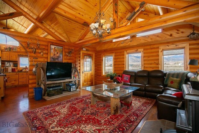 18 7m4r Rd, Sheridan, MT 59749 - living room featuring wooden ceiling, a chandelier, log walls, and wood-type flooring