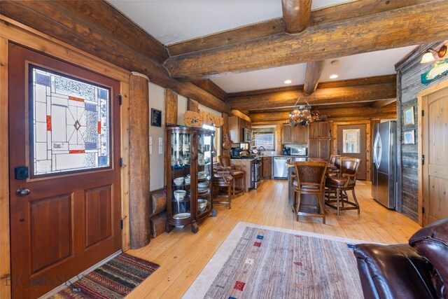 6 Browtine Ln, Ennis, MT 59729 - foyer featuring recessed lighting, rustic walls, light wood-style flooring, and beam ceiling