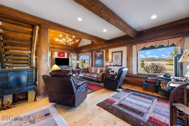 6 Browtine Ln, Ennis, MT 59729 - living area featuring light wood-type flooring, recessed lighting, a notable chandelier, and beamed ceiling