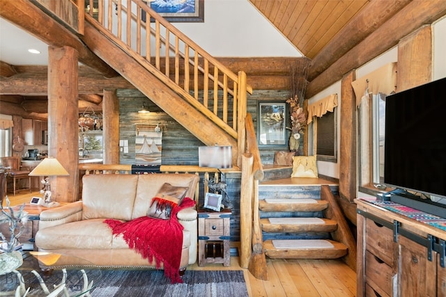 6 Browtine Ln, Ennis, MT 59729 - living room with wooden ceiling, rustic walls, recessed lighting, wood-type flooring, and high vaulted ceiling
