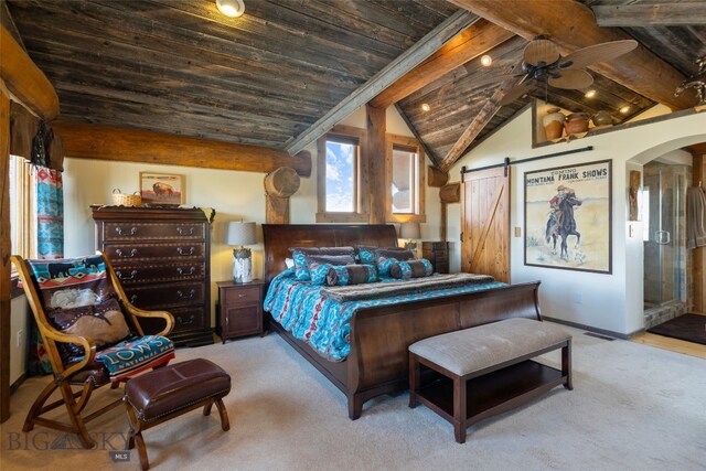 6 Browtine Ln, Ennis, MT 59729 - bedroom featuring arched walkways, vaulted ceiling with beams, a barn door, and wood ceiling