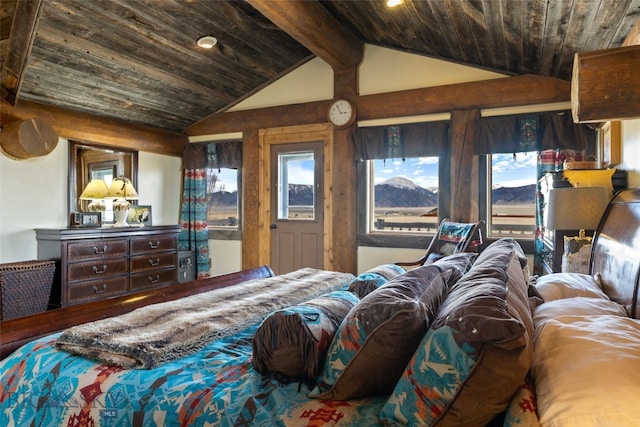 6 Browtine Ln, Ennis, MT 59729 - bedroom with vaulted ceiling with beams, a mountain view, and wood ceiling