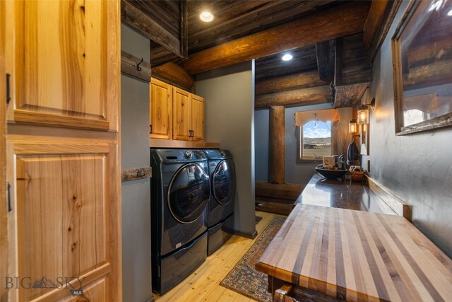 6 Browtine Ln, Ennis, MT 59729 - laundry room featuring recessed lighting, independent washer and dryer, cabinet space, and light wood-style flooring