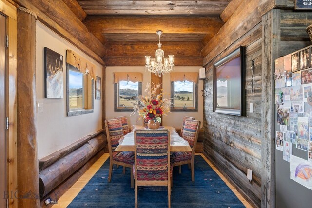 6 Browtine Ln, Ennis, MT 59729 - dining room featuring beamed ceiling and a notable chandelier