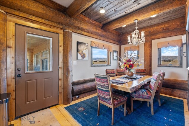 6 Browtine Ln, Ennis, MT 59729 - dining space featuring recessed lighting, an inviting chandelier, beam ceiling, and wood finished floors