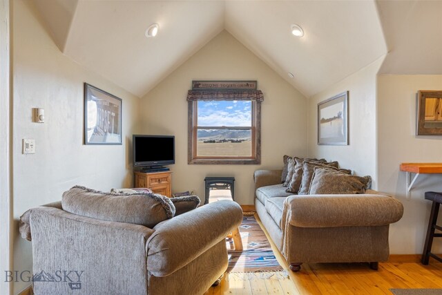6 Browtine Ln, Ennis, MT 59729 - living area featuring lofted ceiling, recessed lighting, light wood-style flooring, and baseboards