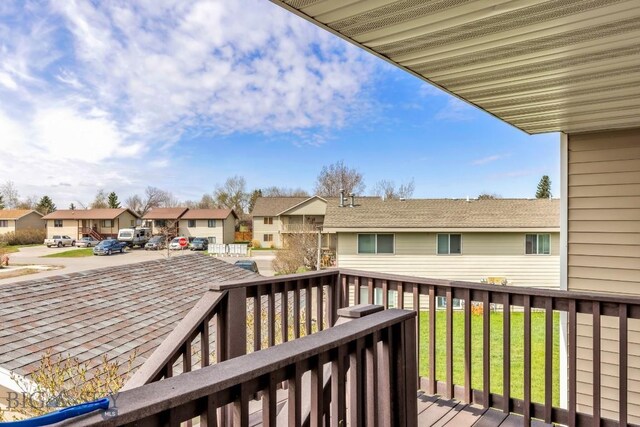 904 Jeanette Pl Unit 4, Belgrade, MT 59714 - wooden deck with a residential view