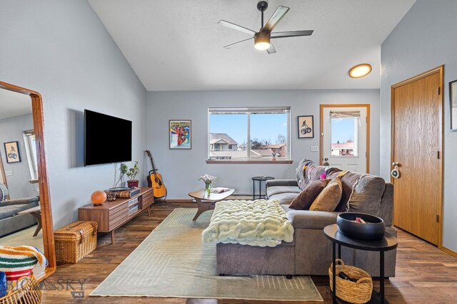 904 Jeanette Pl Unit 4, Belgrade, MT 59714 - living area featuring wood finished floors, ceiling fan, and vaulted ceiling
