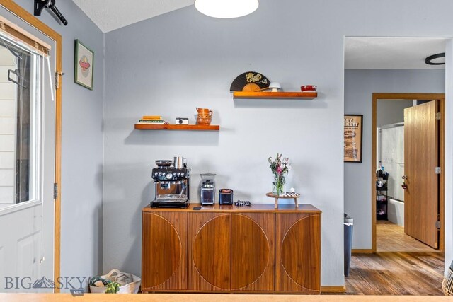 904 Jeanette Pl Unit 4, Belgrade, MT 59714 - bar featuring wood finished floors