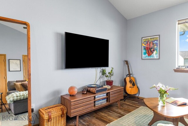 904 Jeanette Pl Unit 4, Belgrade, MT 59714 - living room featuring vaulted ceiling and wood finished floors