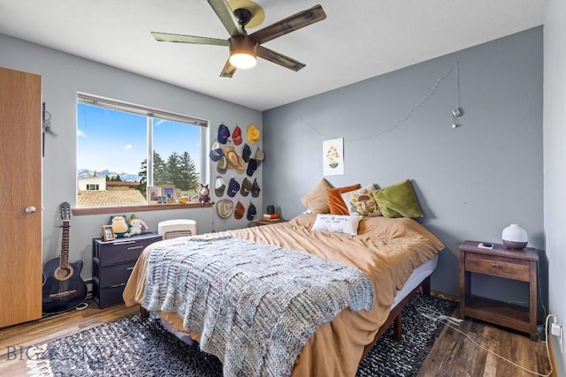 904 Jeanette Pl Unit 4, Belgrade, MT 59714 - bedroom with a ceiling fan and wood finished floors