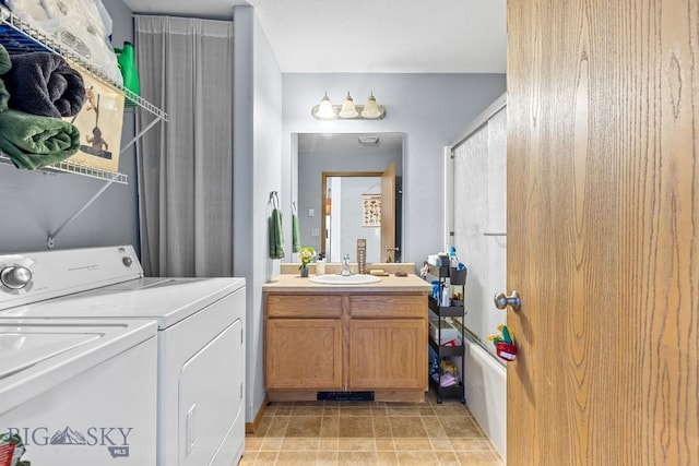 904 Jeanette Pl Unit 4, Belgrade, MT 59714 - full bath featuring shower / washtub combination, washer and dryer, and vanity