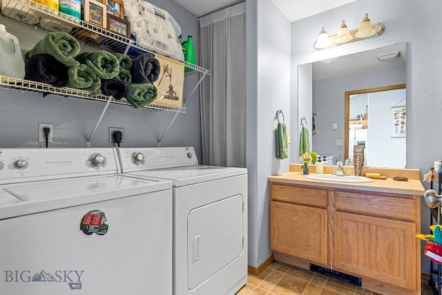 904 Jeanette Pl Unit 4, Belgrade, MT 59714 - washroom featuring independent washer and dryer, visible vents, laundry area, and a sink