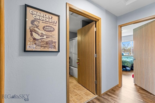 904 Jeanette Pl Unit 4, Belgrade, MT 59714 - hallway featuring visible vents and wood finished floors